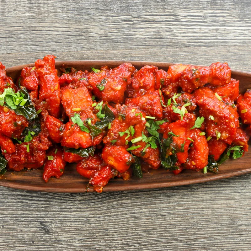 Chicken 65 tossed with curry leaves and cilantro